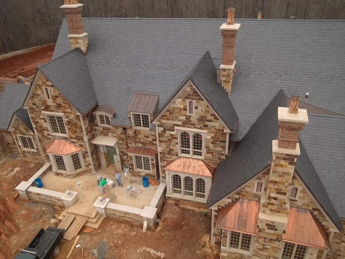 Craftsman Roofing Slate Roof Repair project in Northwest District
